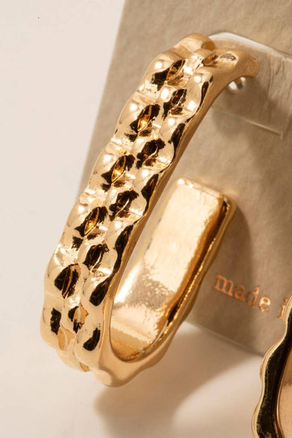 Gold Wavy Oval Hoop Earrings